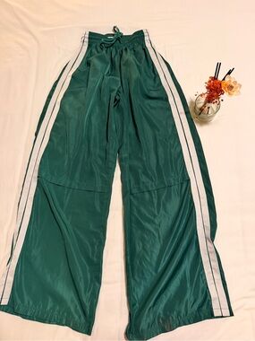 Edikted Emerald Green Track Pants with White Tag Accent